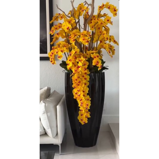 San Jose Vase in shiny black with hanging yellow orchids
