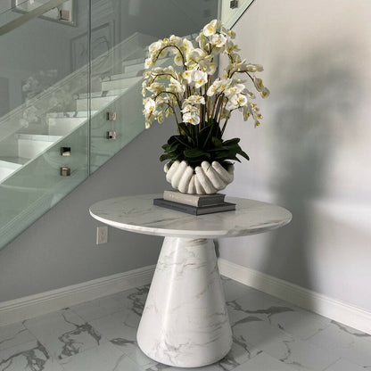 White Phalaenopsis Orchids in Vase with Sculpture "Open Hands"